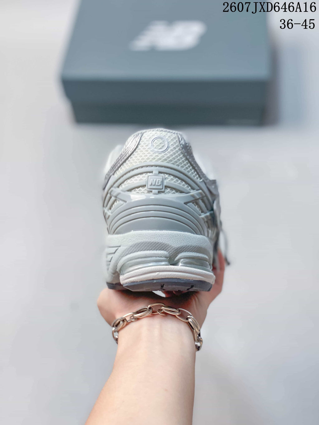 Rear view of the New Balance 1906A sneaker showing the padded heel and layered sole.