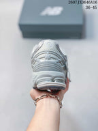 Rear view of the New Balance 1906A sneaker showing the padded heel and layered sole.