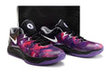Pair of Nike KD 17 shoes in a purple, red, black and white color combination.