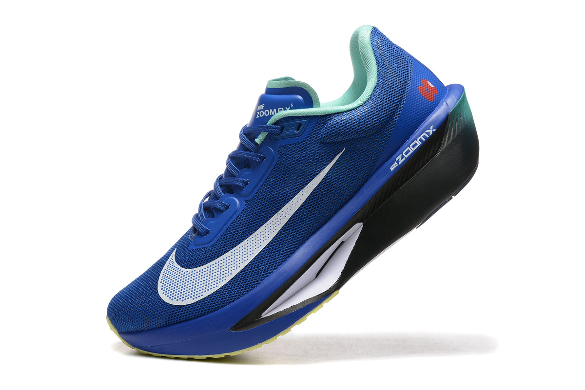 Close view of a blue Nike Zoom Fly 6 shoe with mint trim