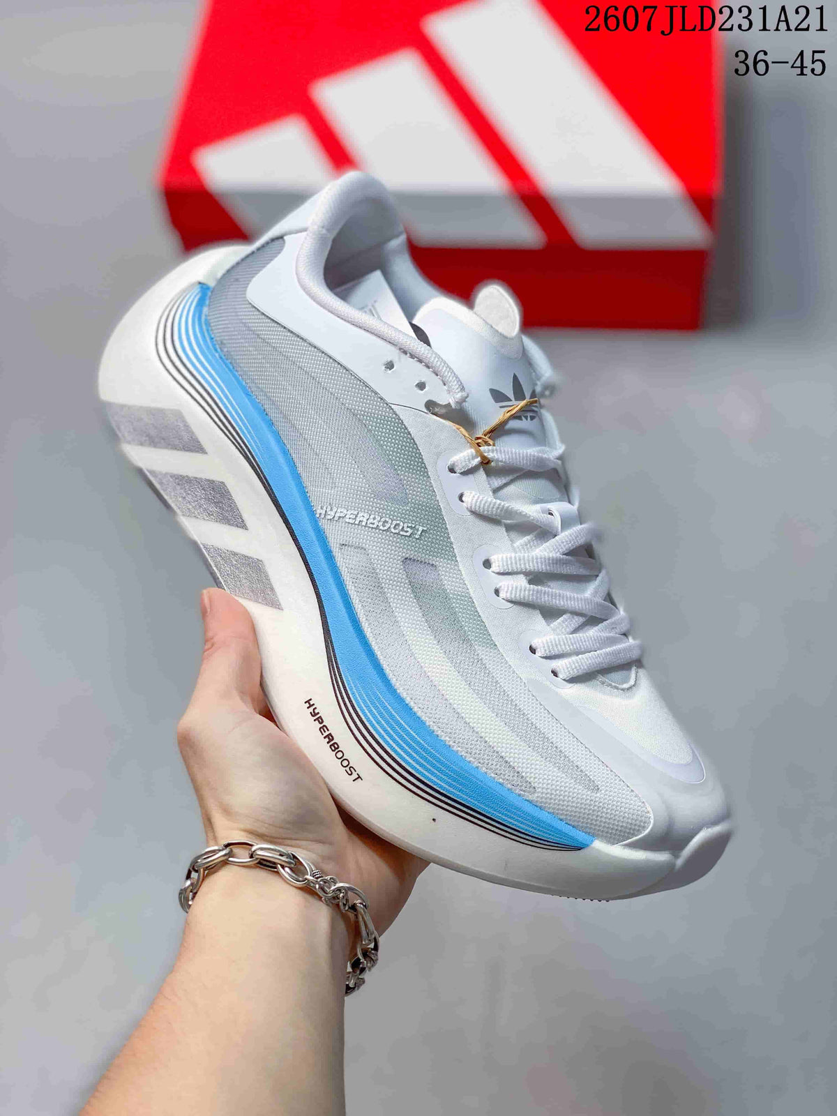Angled side view showing the Adidas branding, Hyperboost lettering, gray upper panels, and blue midsole accent.