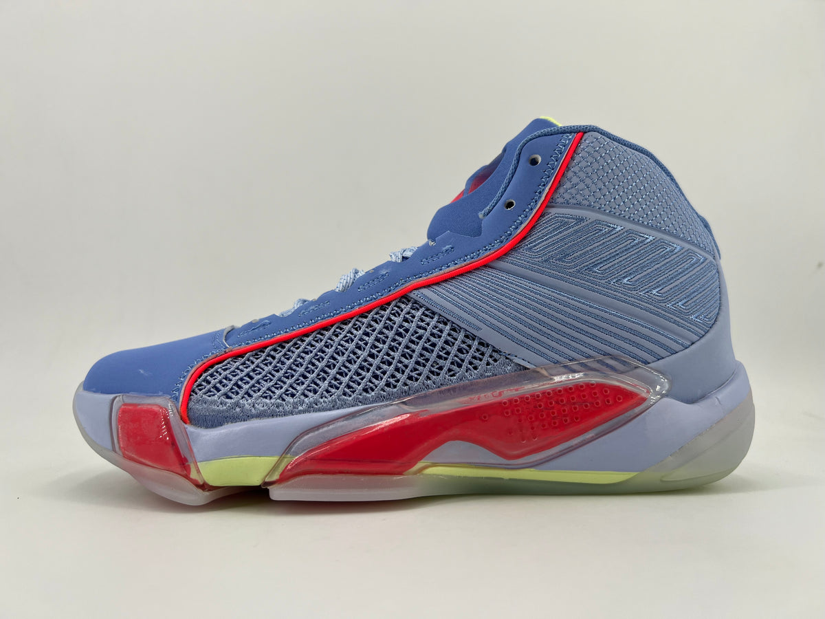 Side view of a blue and lavender Jordan high-top sneaker with red trim and pale yellow accents