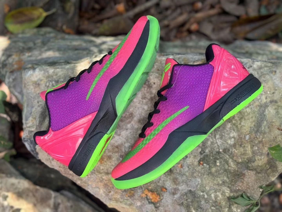Overhead side view of the pair with textured uppers and green soles
