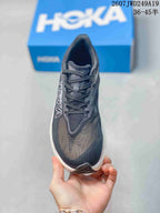 Top view showing the dark mesh toe box, tongue and laces.