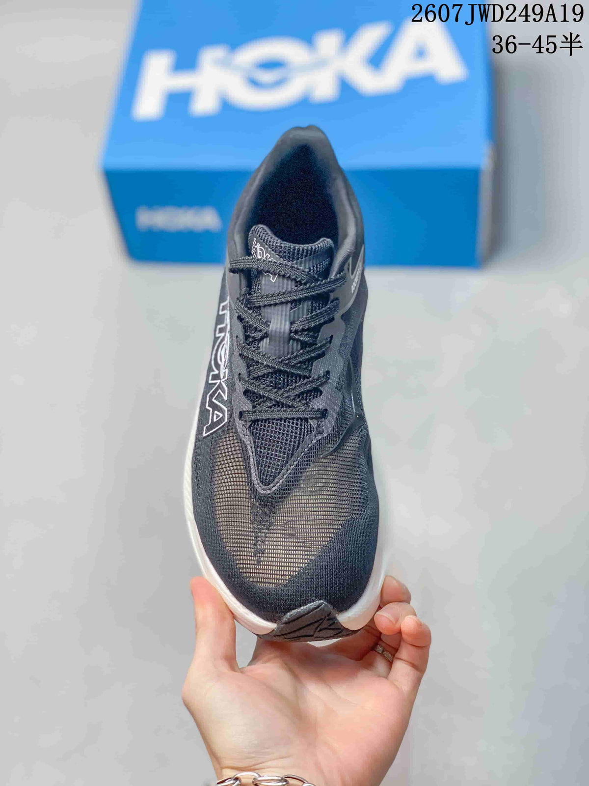 Top view showing the dark mesh toe box, tongue and laces.
