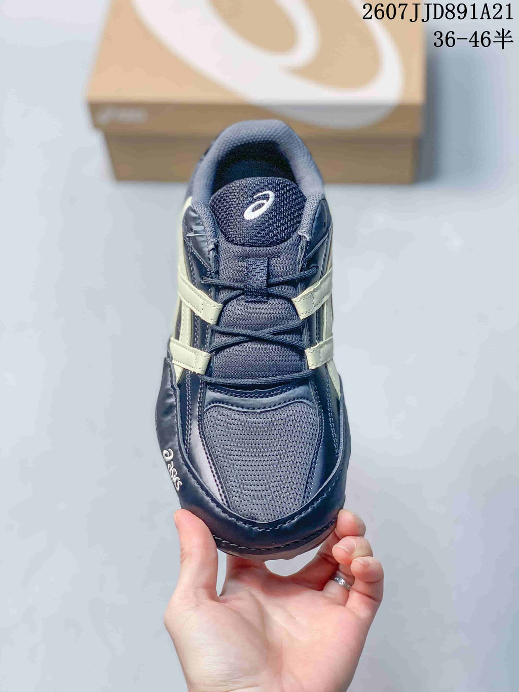 Top view of the ASICS Hypersync sneaker showing the mesh-look toe panel, laces and padded tongue.