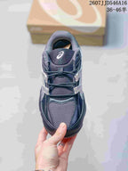 Top view of the ASICS Hypersync sneaker showing the mesh-like toe and tongue panels, laces, and branding.