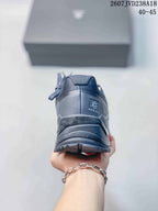 Rear view of the dark gray hiking shoe showing the padded heel, Kailas branding, and layered outsole.