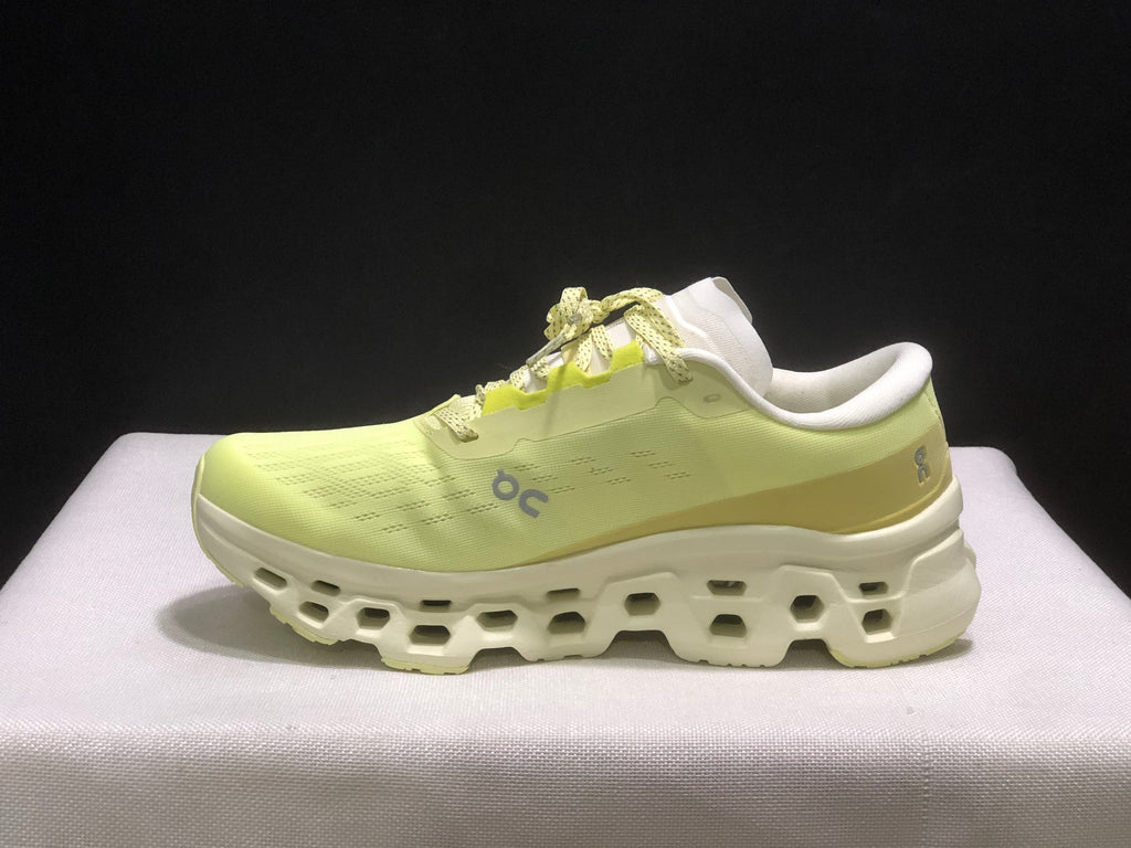 Lateral side view showing the On logo, lace system, and geometric midsole design.
