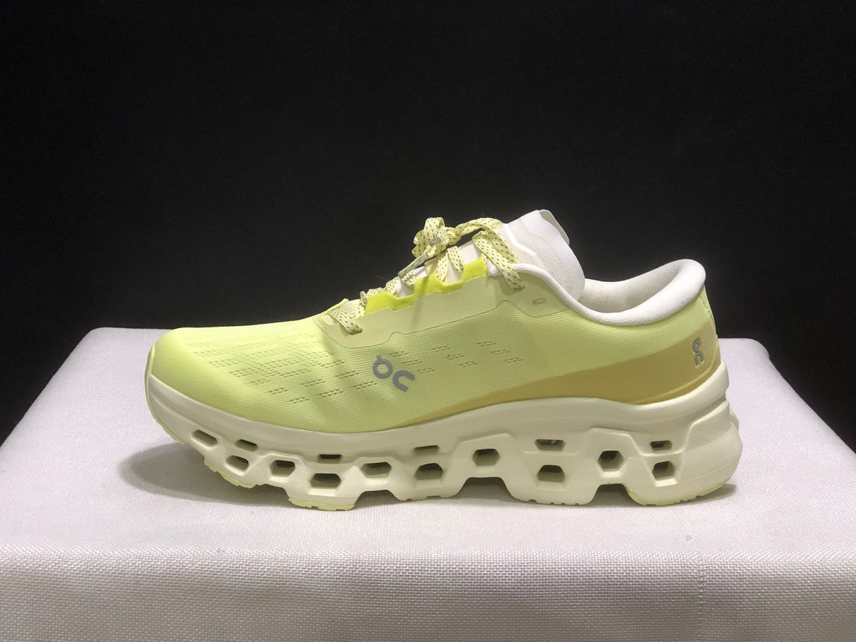 Lateral side view showing the On logo, lace system, and geometric midsole design.