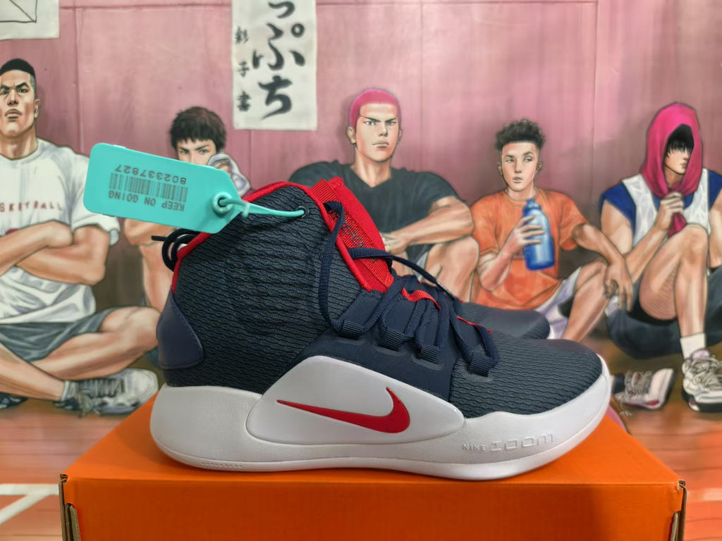 Side view showing the red Nike Swoosh and white sole
