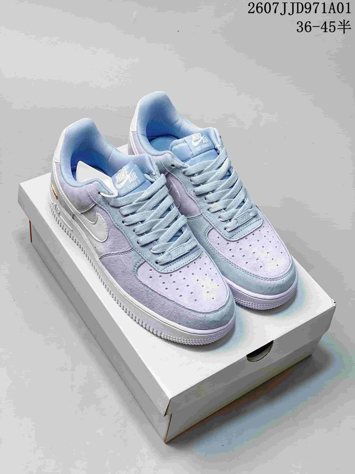 Pastel blue and lavender Nike Air Force 1 ’07 low-top sneakers on a shoe box; image also shows a tan and cream colorway and the printed size range 36–45.