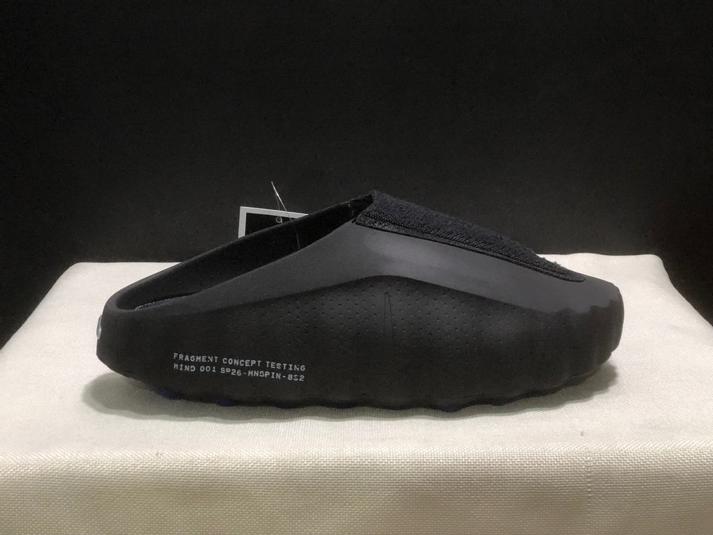 Side view showing the printed Fragment Concept Testing and Mind 001 text on the black upper.