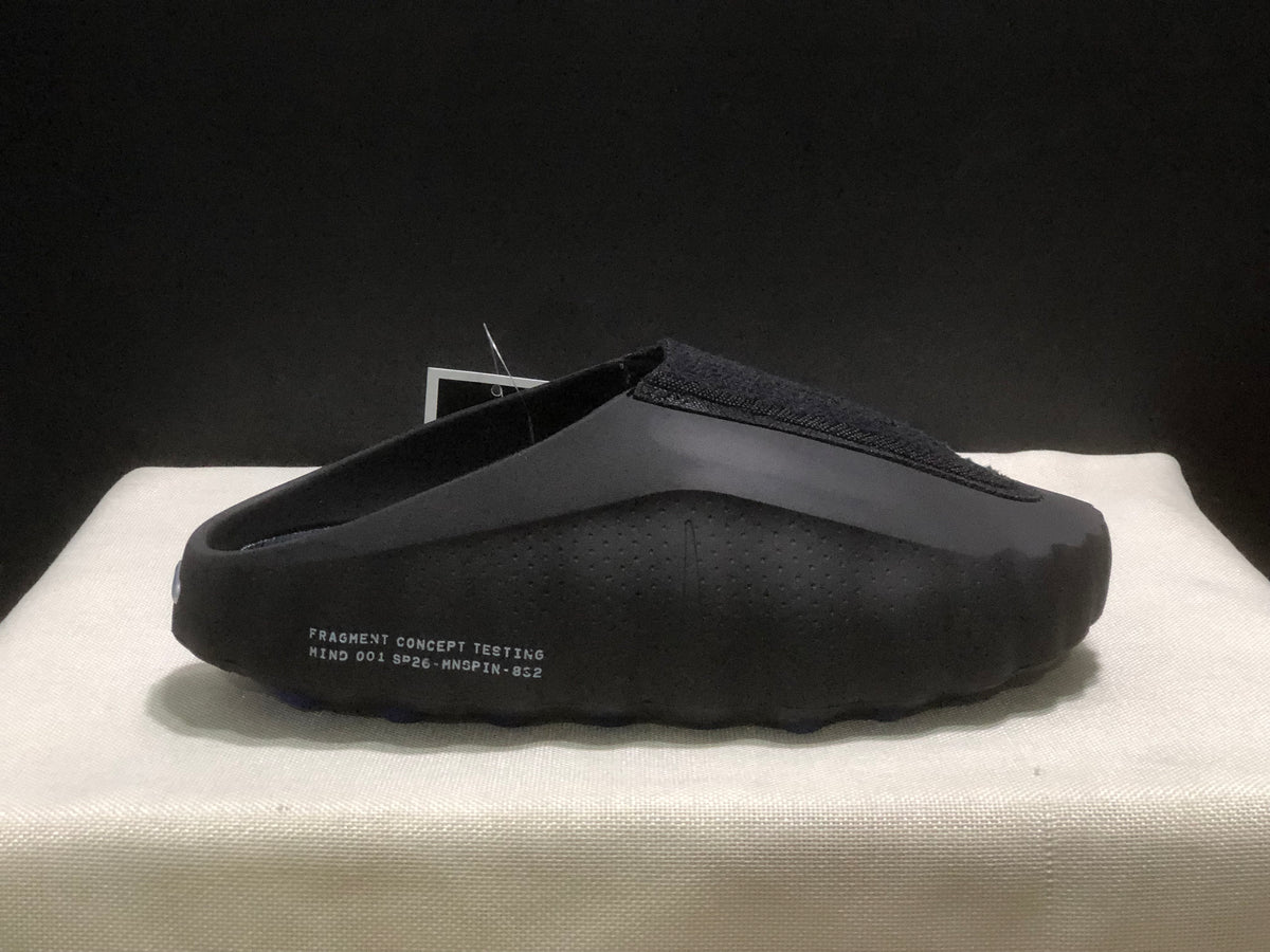 Side view showing the printed Fragment Concept Testing and Mind 001 text on the black upper.