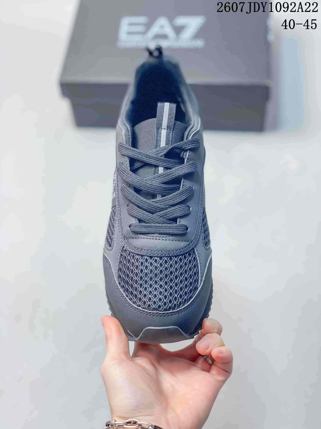 Front view of the dark gray lace-up sneaker showing the patterned mesh-style toe panel and rounded toe; image text shows JDY1092A22 and 40–45.