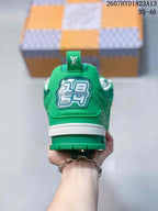 Rear view of the green sneaker showing the branded heel patch, white midsole and green heel pull tab.