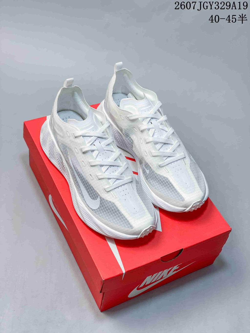 Pair of white Nike Ava X Rover sneakers displayed on a red Nike shoebox; overlay text shows style reference 2607TGY329A19 and sizes 40–45 with half sizes.