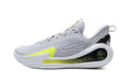 Side view of gray basketball shoes with white and bright green accents and a sculpted sole
