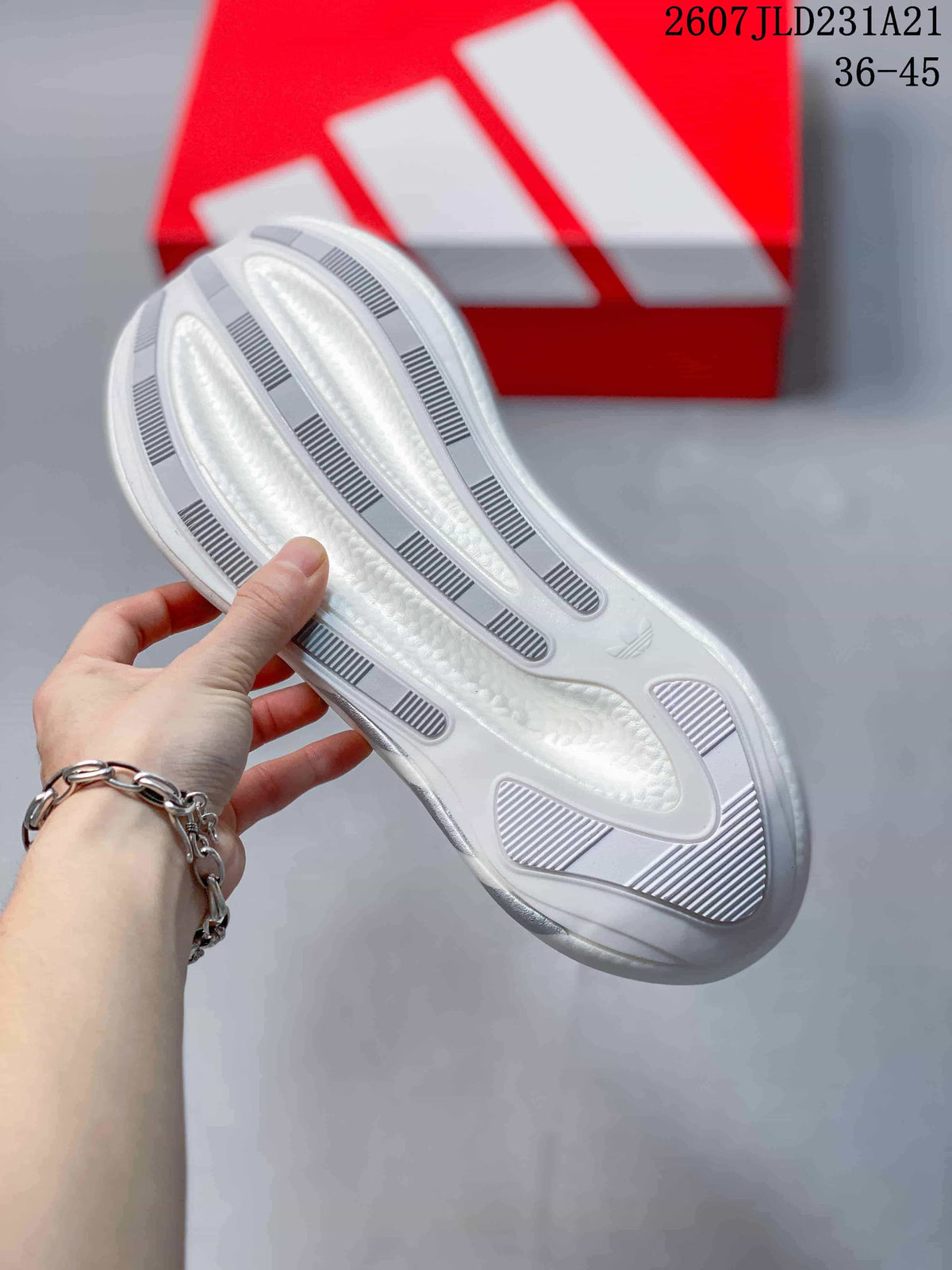 View of the textured outsole with elongated traction sections and a central patterned area.