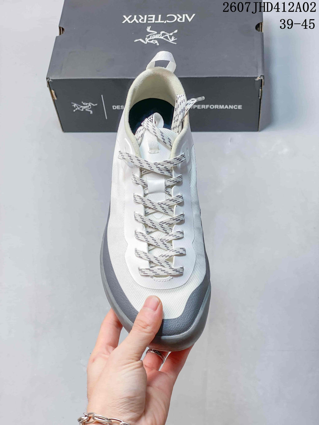 Front view showing the patterned laces and gray toe overlay
