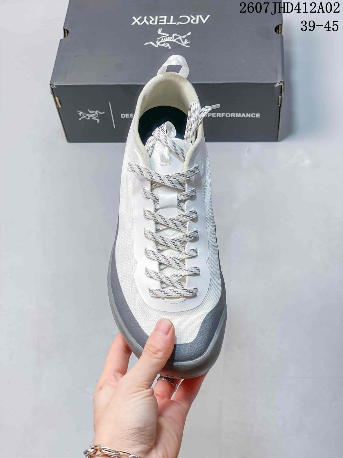 Front view showing the patterned laces and gray toe overlay