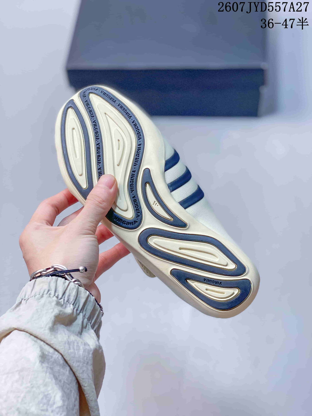 Close view of the sneaker outsole showing sculpted sections and repeated Virginia lettering.