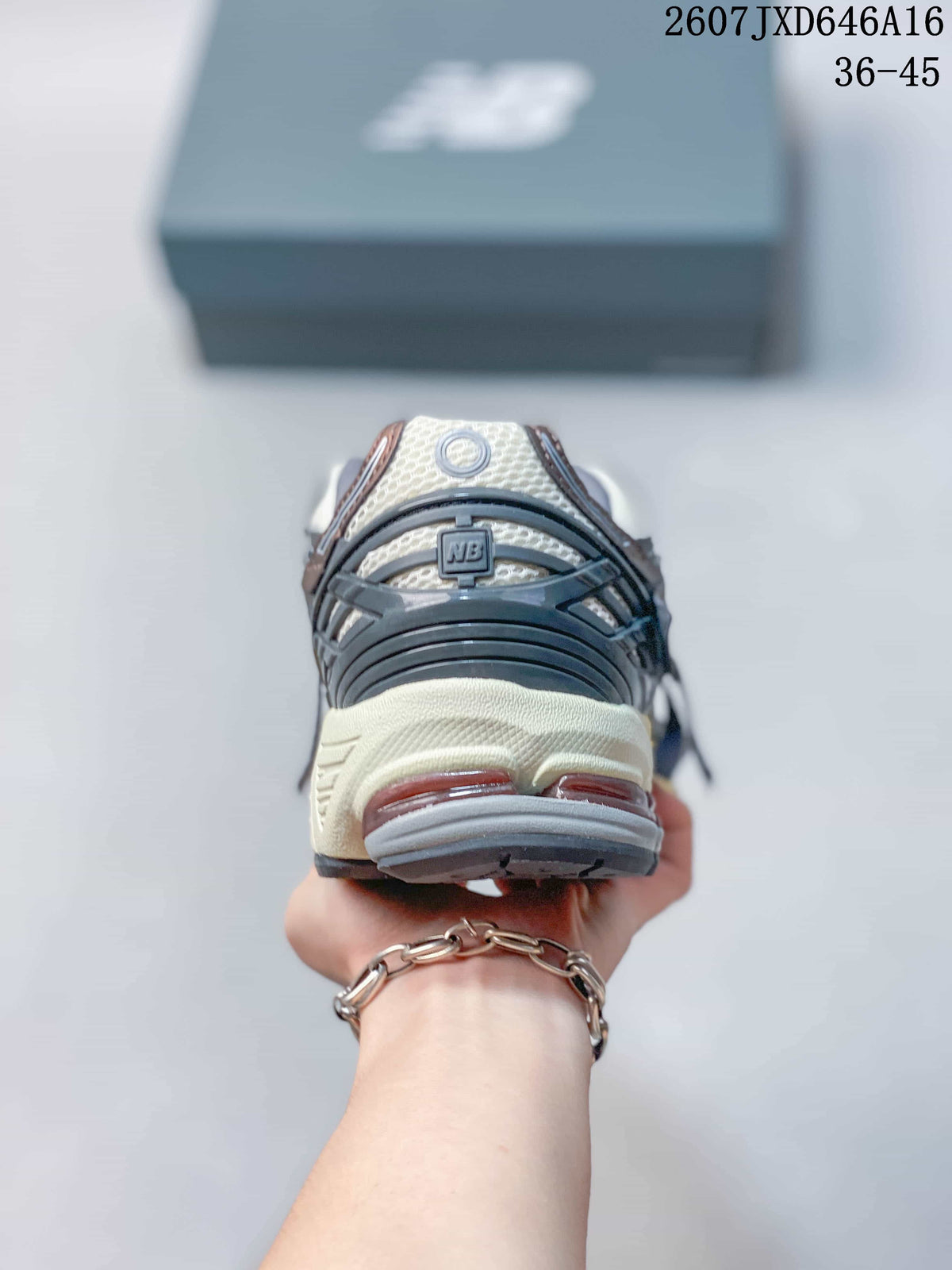 Rear view of the New Balance sneaker showing the layered heel structure and outsole.