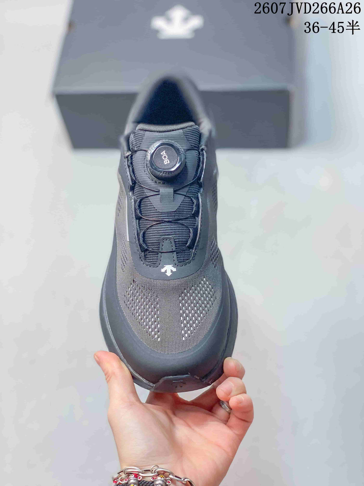 Top view of the sneaker showing the dial closure, tongue, and perforated forefoot panels.