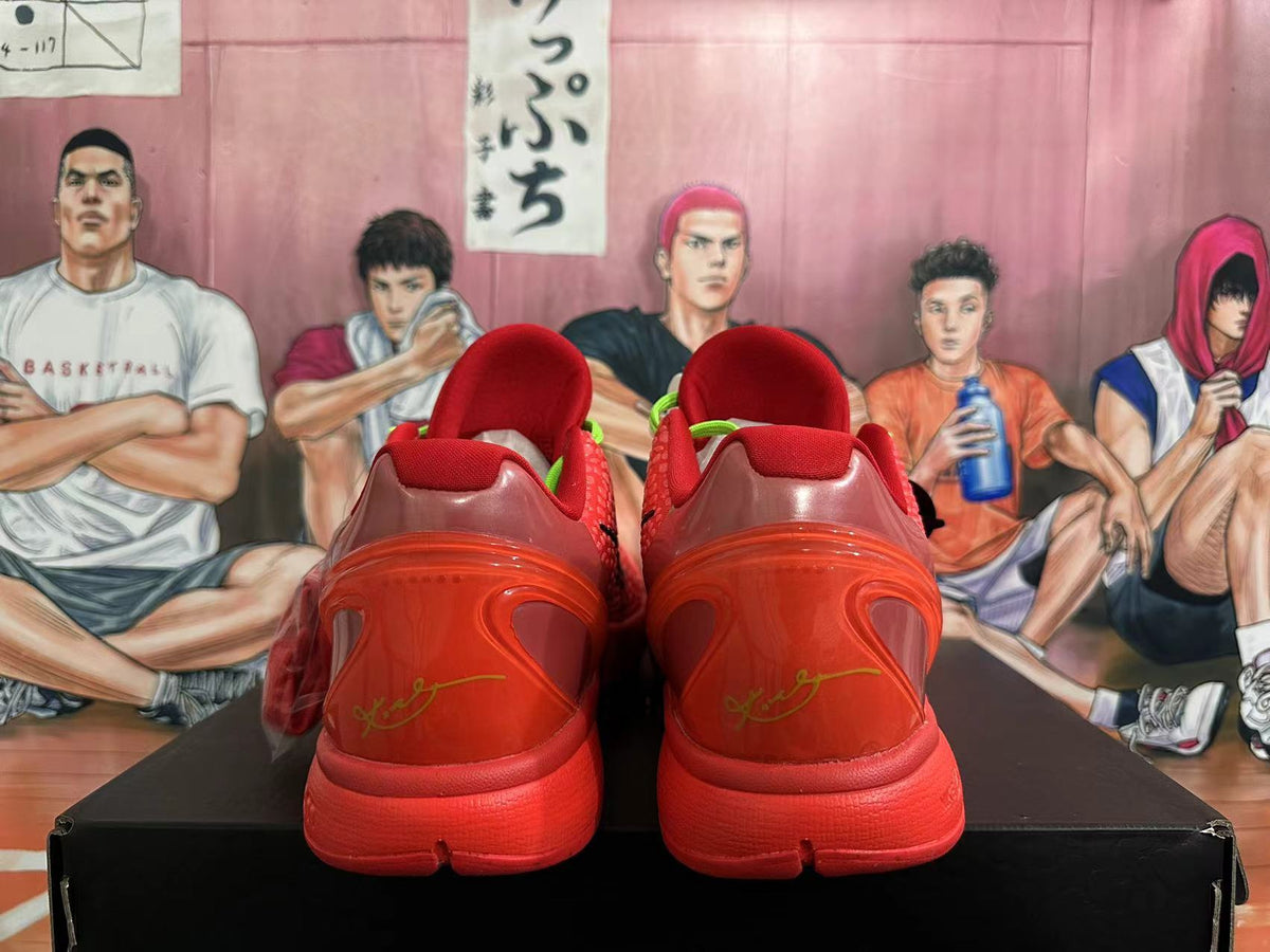 Rear view showing the red heel counters and outsoles.