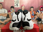 Front view of white and black Nike The Glove shoes showing the zip-up shrouds and Swoosh details