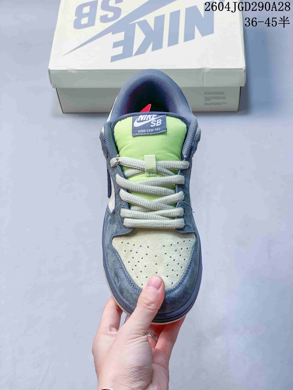 Front view showing the perforated toe, laces, and lime tongue