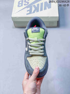 Front view showing the perforated toe, laces, and lime tongue