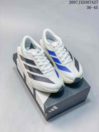 Pair of white adidas Adizero Evo SL ATR sneakers with blue and black side stripes displayed on an adidas shoebox.