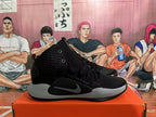 Side view of a black Nike Hyperdunk basketball shoe with grey midsole and Swoosh