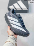 Side view of the adidas sneaker showing the Adizero Evo SL marking, white stripes and Lightstrike Pro text on the midsole area.