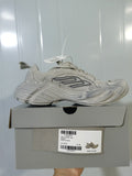 Beige New Balance 9090 sneaker displayed on its box; the label identifies WMNS 9090, Full Beige, width E, and size 42.