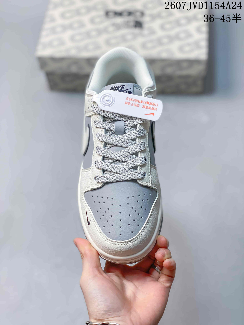 Top-down view showing the perforated grey toe panel, patterned laces and contrasting overlays.