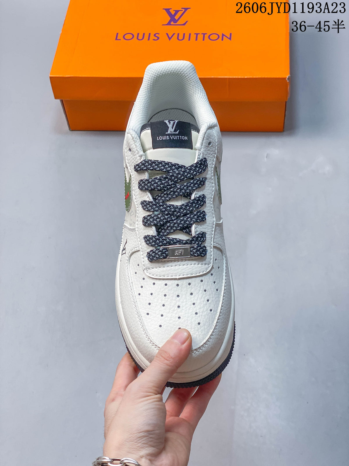 Front view highlighting the perforated toe and dark patterned laces.