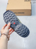 Close-up of the Salomon shoe outsole showing its lugged tread pattern