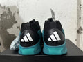 Rear view of navy-blue and black Adidas basketball shoes with three-stripe heel branding