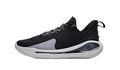 Side view of a black and gray low-top sneaker with laces and a light-colored sole.