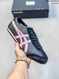 Dark gray low-top sneaker with pink side stripes and black laces