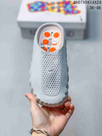 Top view showing the covered toe, perforated upper panel, and small Swoosh detail.