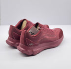 Three-quarter rear view of the burgundy alo Runner sneakers with heel branding.