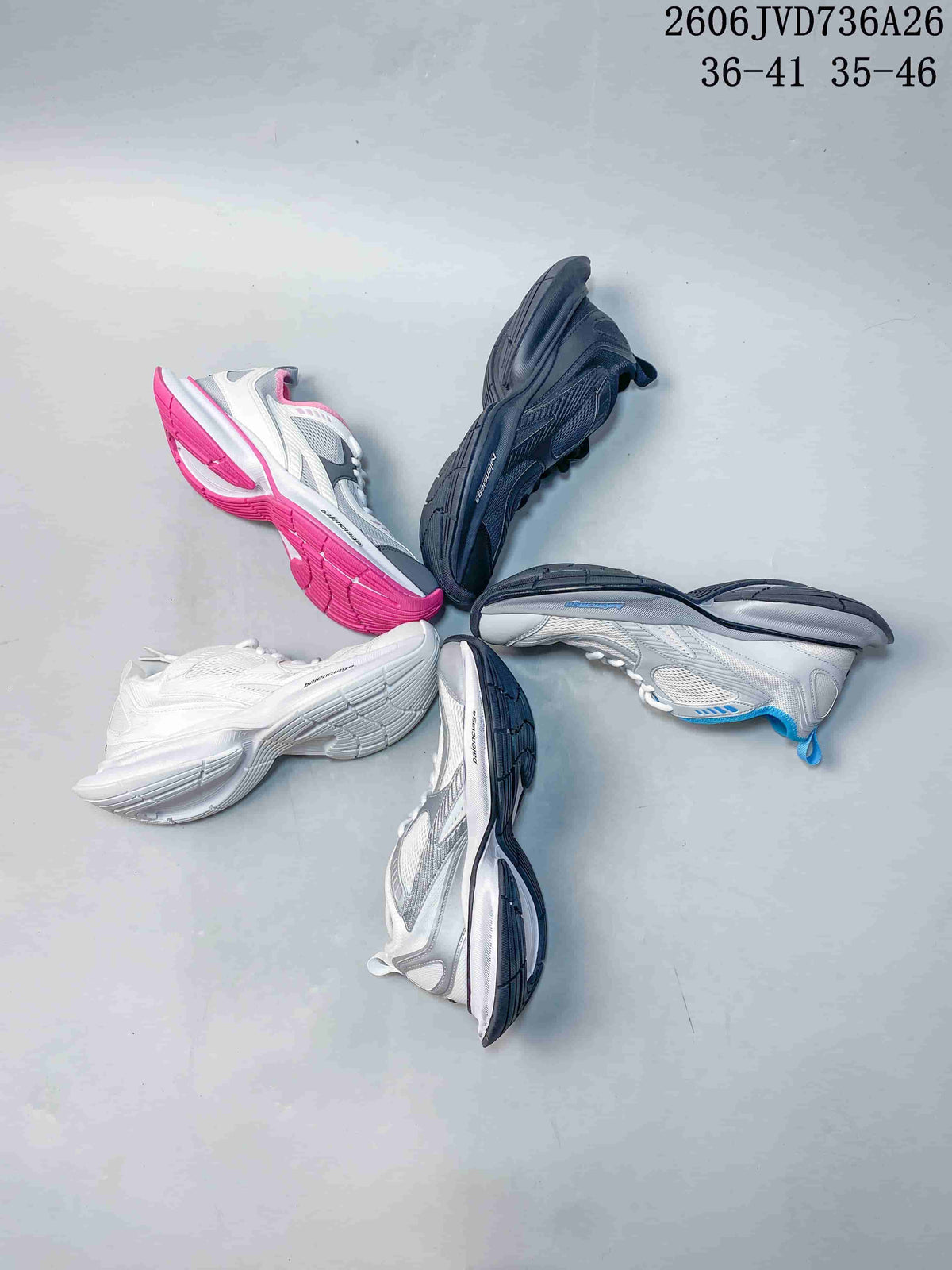 Several colorways of chunky mesh sneakers arranged together
