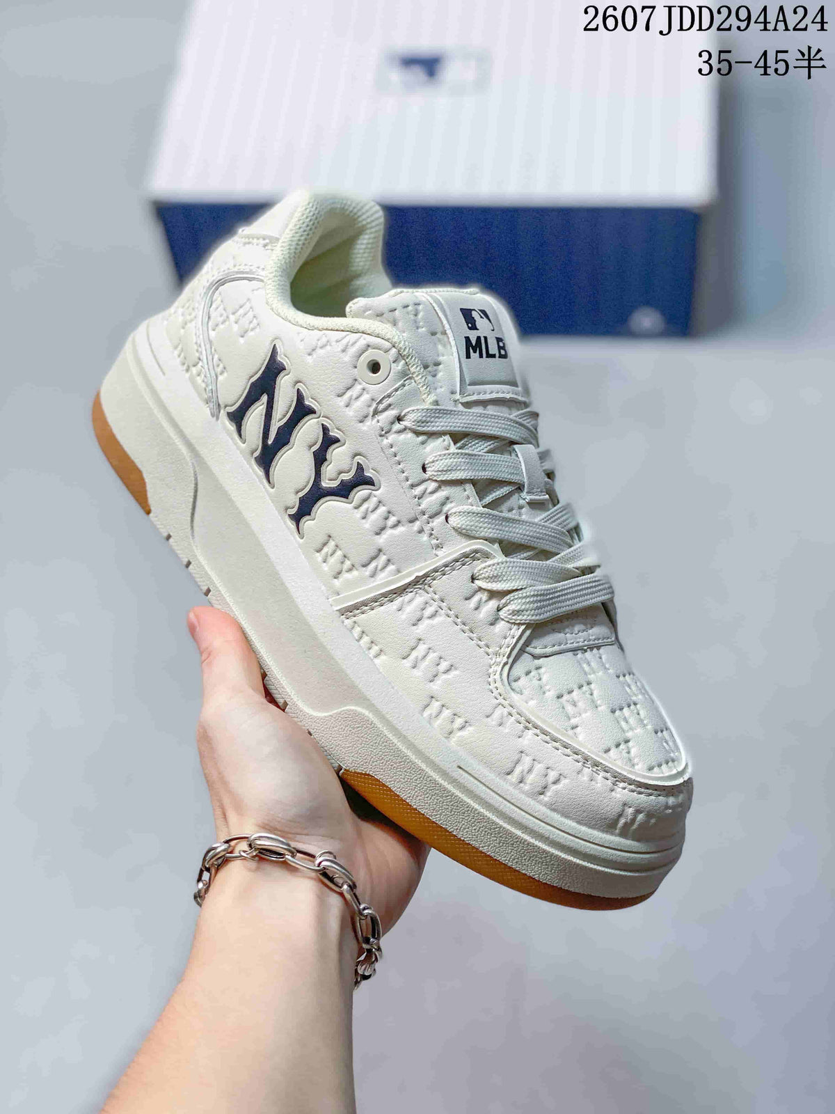 Close-up side view of a white MLB sneaker with dark side branding and a contrasting outsole; visible overlay text includes a 35–45 size range.