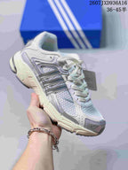 White and pale gray adidas Response CL sneaker with reflective-looking gray side stripes and a light outsole.