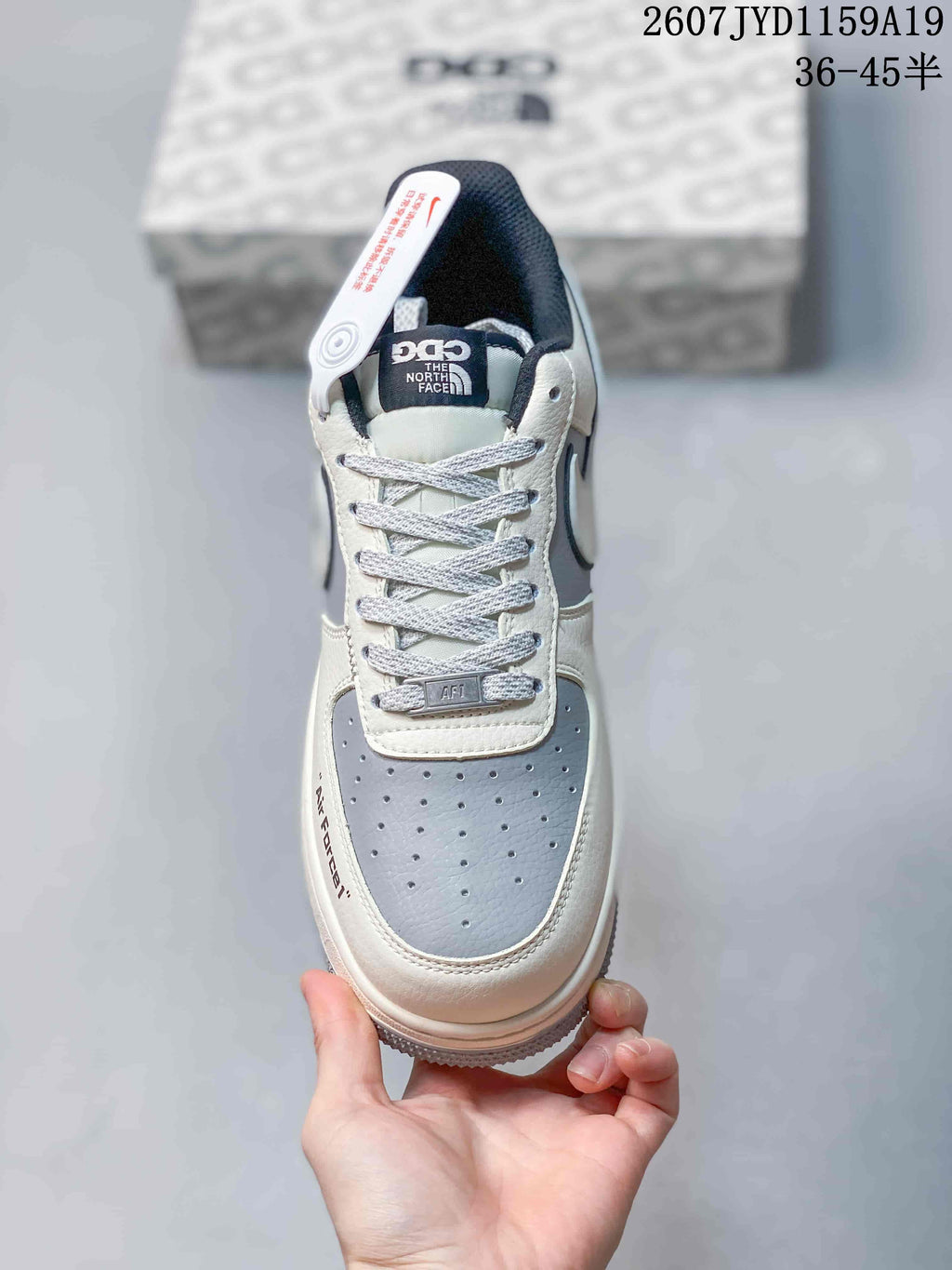 Top view showing the perforated toe box, tonal laces, padded collar, and tongue branding.