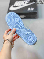 Close-up of the light blue outsole showing circular traction patterns and textured edges.