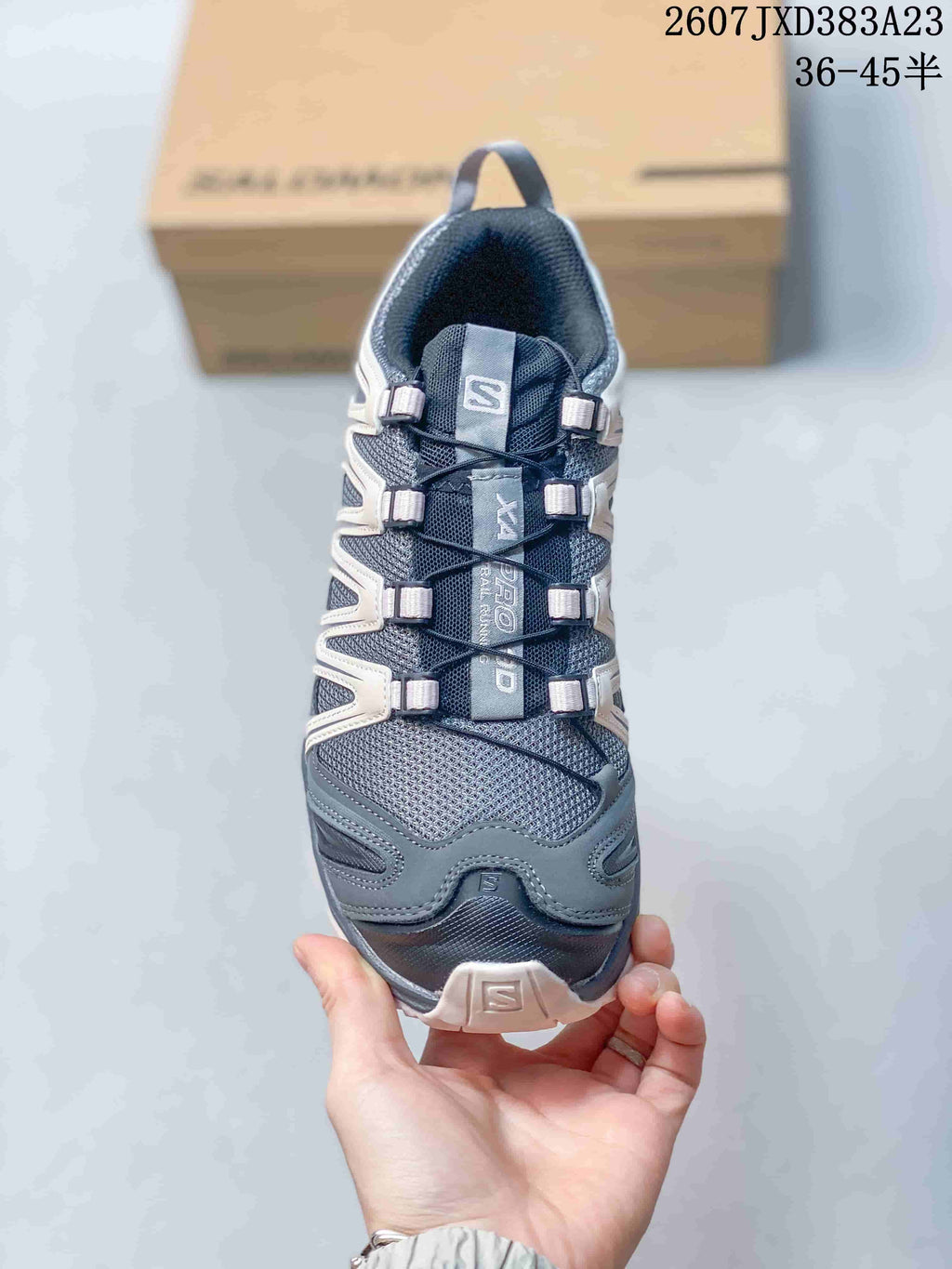 Top view showing the mesh toe box, layered lace-area overlays, tongue branding, and quick-lace style lacing.